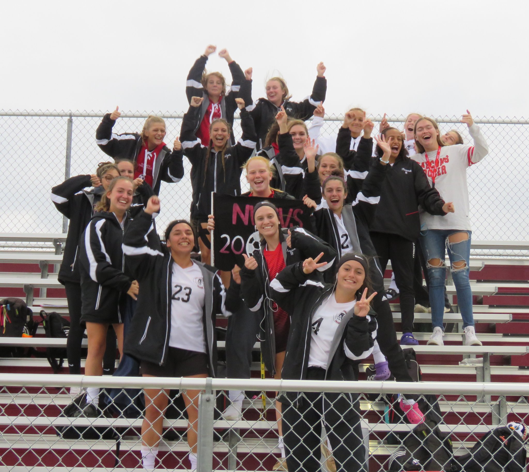 The game might not have went their way Thursday night, but the Falcons girls soccer team was in full support mode when the boys team played in the crossover championship hours before their own title game versus Grand Island. (Photo by David Yarger)